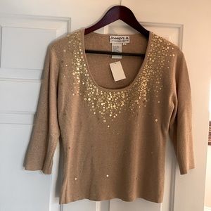 Holiday style top. Gold threading and sequins make it festive.